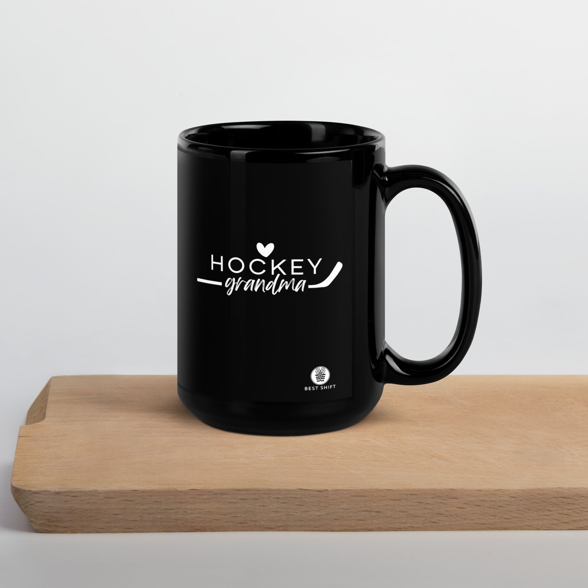 https://www.bestshifthockey.com/cdn/shop/files/black-glossy-mug-black-15oz-handle-on-right-64483ad148de6.jpg?v=1682455256&width=1946